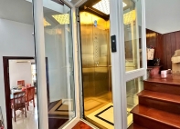 Homelift Cửa Bản Lề - Giải Pháp Thang Máy Gia Đình Tiết Kiệm Diện Tích
