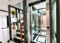 Thang máy kính giá bao nhiêu? Bảng giá & Yếu tố ảnh hưởng chi tiết 2024